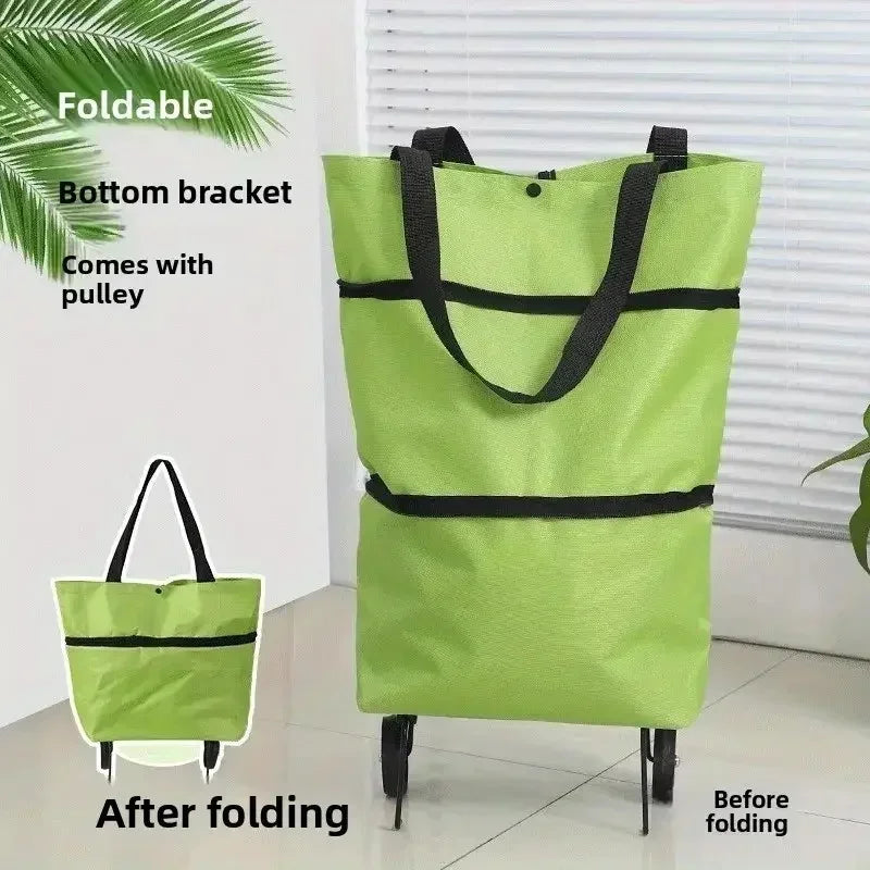 Foldable portable shopping cart with wheels being used outdoors as a lightweight hand cart for grocery and home shopping.