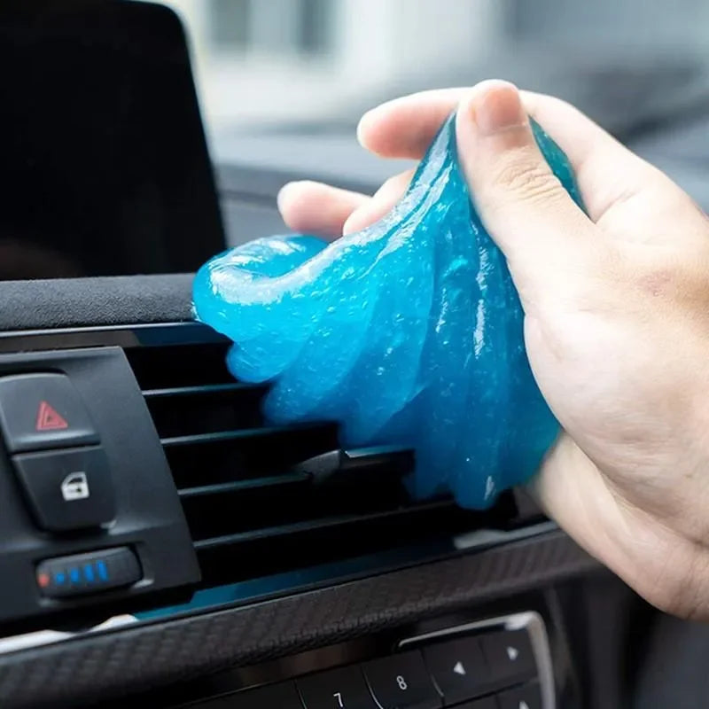 Magic Cleaning Gel Dust Remover cleaning a keyboard and hard-to-reach spaces on electronics, car interiors, remote controls, and household surfaces