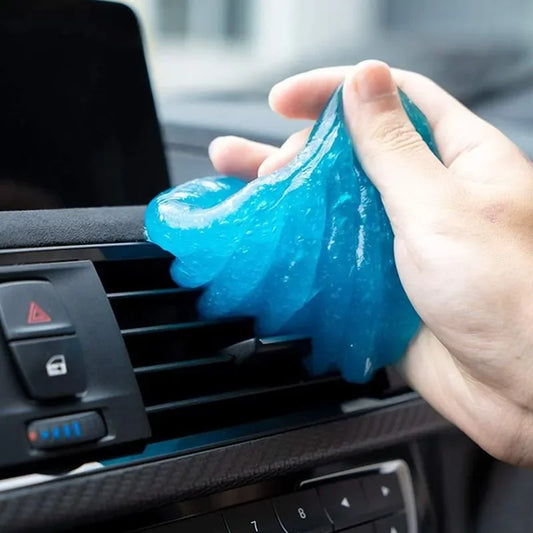 Magic Cleaning Gel Dust Remover cleaning a keyboard and hard-to-reach spaces on electronics, car interiors, remote controls, and household surfaces